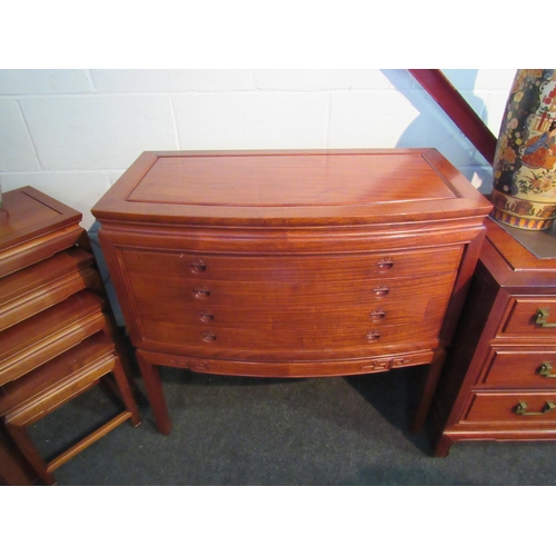 1009 - A Chinese elm bow front canteen chest of four drawers with carved recess handles on shaped legs (no ... 