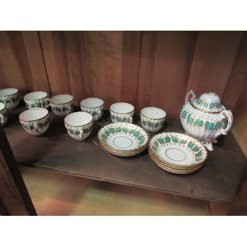 1047 - A Victorian white ground tea service, gilt and turquoise floral detailing, some pieces a/f