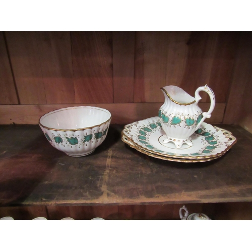 1047 - A Victorian white ground tea service, gilt and turquoise floral detailing, some pieces a/f