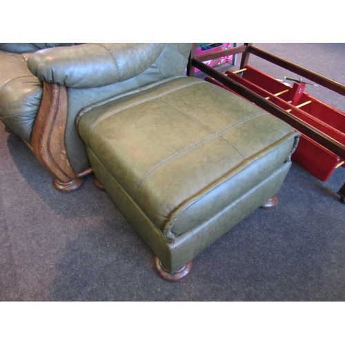 1163 - A four piece leather and oak framed suite comprising of a three seater sofa, armchair, reclining arm... 