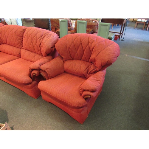 1180 - A G-Plan red upholstered three piece suite comprising of a large two seater sofa and two armchairs  ... 