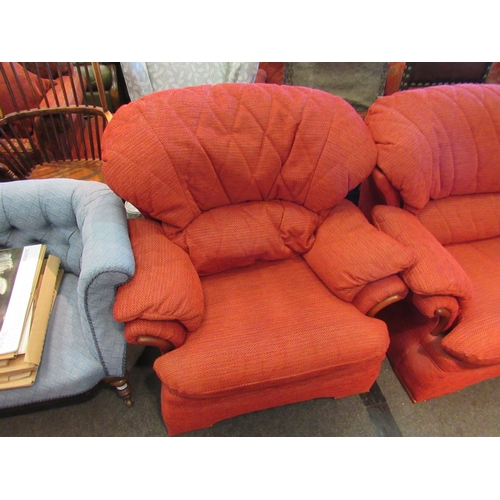 1180 - A G-Plan red upholstered three piece suite comprising of a large two seater sofa and two armchairs  ... 