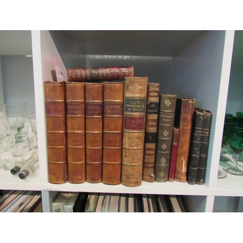 1395 - Twelve antique books, mostly leather bound including four quarterly review books dated 1850-1852, Th... 