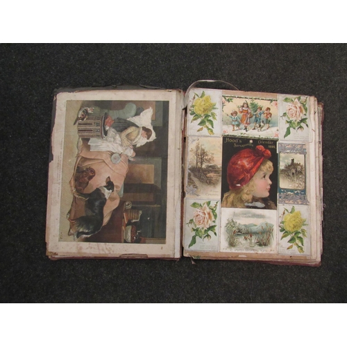 1416 - A late 19th Century scrap album containing scraps of animals, flowers, advertising etc, folio contem... 