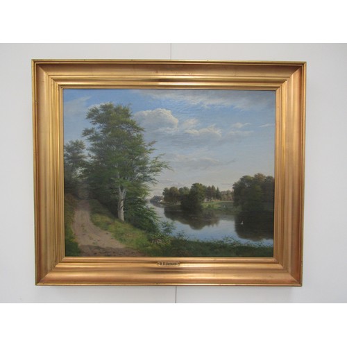 6069 - EILER RASMUSSEN EILERSEN (Danish 1827-1912) A gilt framed oil on canvas, Danish riverside path with ... 