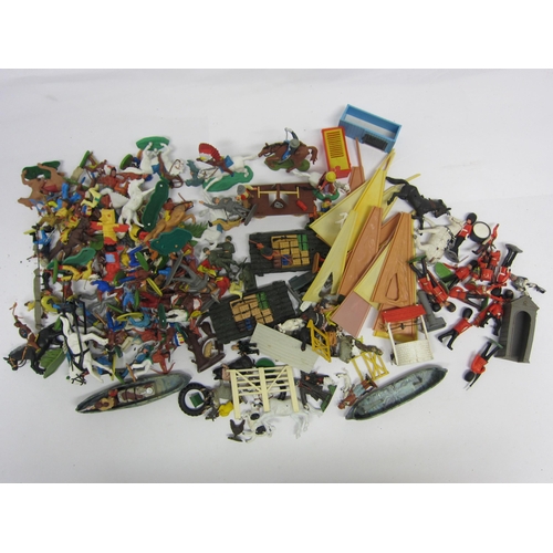 8378 - A collection of Britains, Timpo and other plastic figures including cowboys and Native Americans, gu... 