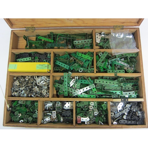 8357 - A very large collection of assorted Meccano parts including plates, strips, brackets, girders to inc... 