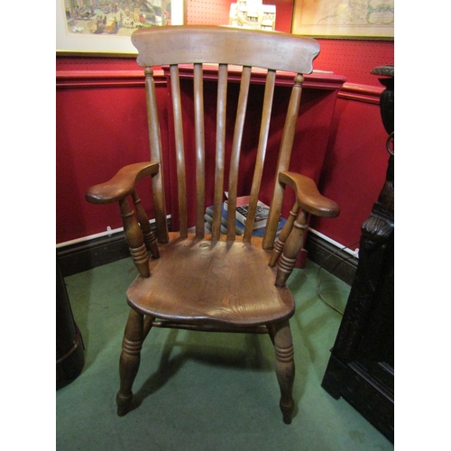 4018 - A Circa 1880 ash and elm seat, lathe back farmhouse armchair on ring turned arm supports and legs, j... 