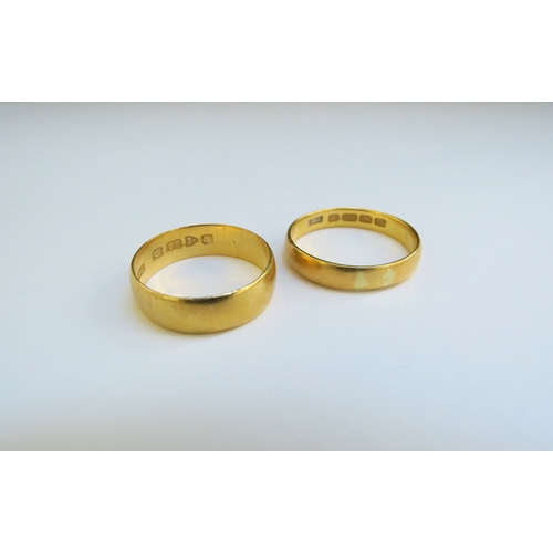 9332 - Two 22ct gold wedding bands, sizes R/S and O/P, 7.6g