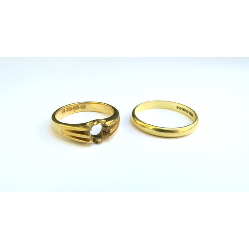 9331 - An 18ct gold wedding band, size Q and an 18ct gold ring shank, stone missing, size L/M, 7.8g