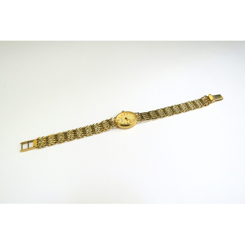 9237 - A 9ct gold Accurist wristwatch with 9ct gold strap, 14g