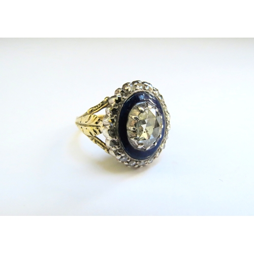 9144 - A Georgian diamond and blue enamel ring, the centre rose cut flatback diamond framed by blue enamel ... 