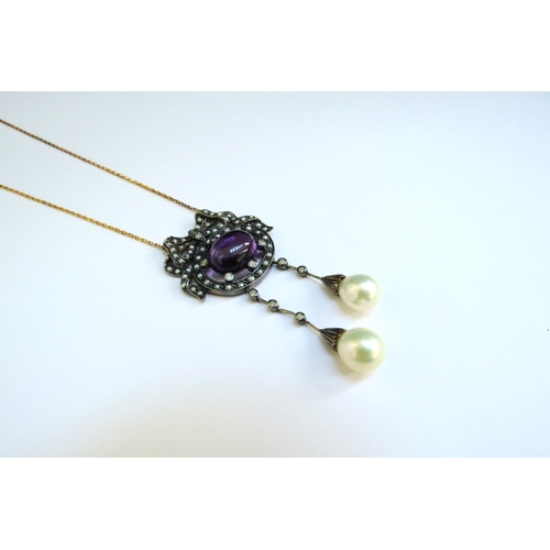 9018 - A Victorian seed pearl, diamond and cabochon amethyst set pendant with pearl drops on diamond set ba... 