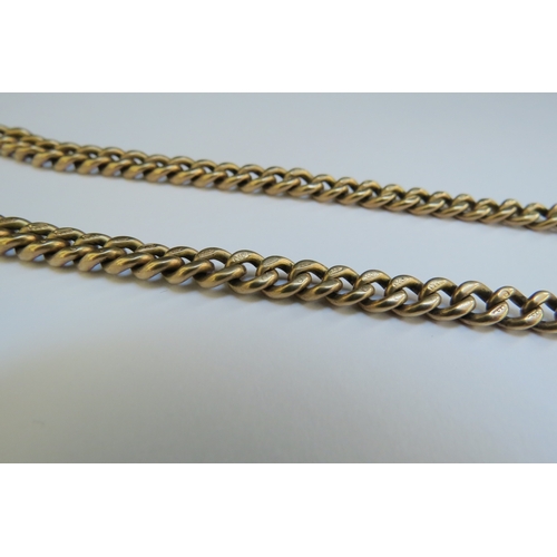 9342 - A 9ct gold watch chain with T-bar, 35cm long, 35.8g