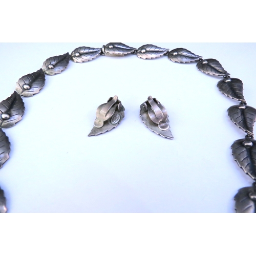 9310 - A mid century Danish silver necklace by John Lauritzen comprising leaf shaped decorative links, conc... 