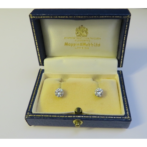 9138 - A pair of diamond stud earrings, 1.50-2ct total approx, 6mm diameter x 4mm deep