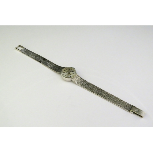 9142 - A 9ct white gold Tissot wristwatch, bracelet as found