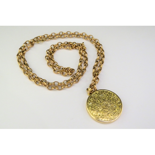 9182 - A 9ct rose gold belcher chain necklace, 80cm long, 28.8g hung with a 15ct gold engraved circular dou... 