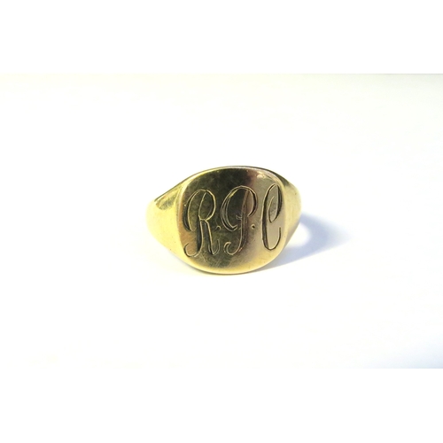 9179 - A 9ct gold signet ring monogrammed R.P.C. Size R, 3.5g