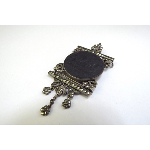 9242 - A Black basalt medallion 