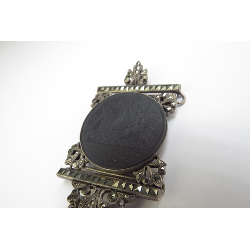 9242 - A Black basalt medallion 