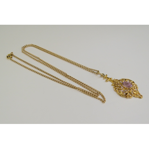 9226 - A 9ct gold chain 62cm long, hung with a scrolled foliate pendant with central amethyst, 4cm drop, 8.... 