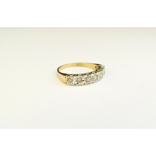 9171 - A 9ct gold illusion set diamond half hoop ring. Size L, 1.9g