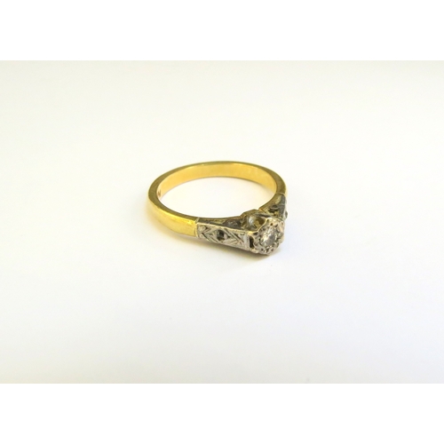 9214 - An illusion set diamond ring, stamped 18ct/plat. Size K, 3.4g  (C)