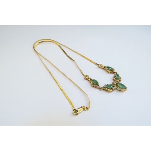 9295 - A 9ct gold emerald and diamond necklace, the five marquise shape emeralds studded with diamond to mo... 