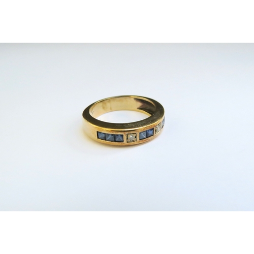 9264 - A square cut sapphire and brilliant cut diamond half hoop, stamped 9ct. Size P, 4.8g