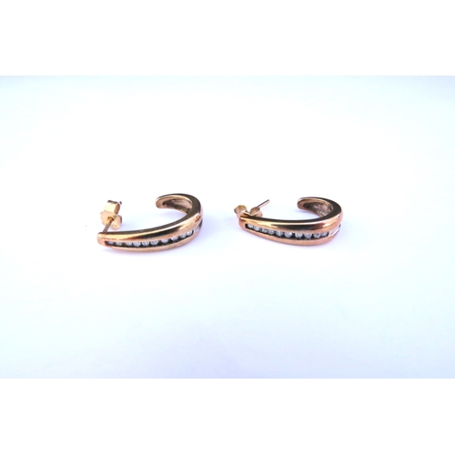 9148 - A pair of gold half hoop earrings with a central line of diamonds, stamped 375, 4.8g  (C)