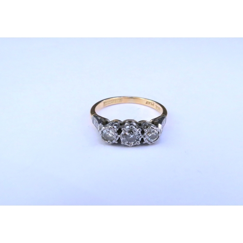 9298 - A three stone diamond ring, stamped 18ct/plat. Size J/K, 2.6g  (C)