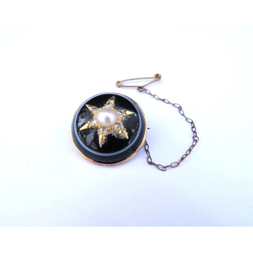 9317 - A domed banded agate brooch with central star motif with pearl centre and diamond studded points, 2c... 