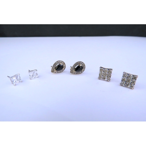 9207 - Three pairs of earrings including, diamond, crystal and sapphire and diamond