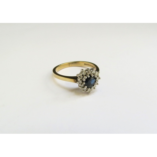 9253 - A 9ct gold sapphire and diamond heart shaped ring. Size K/L, 2.4g