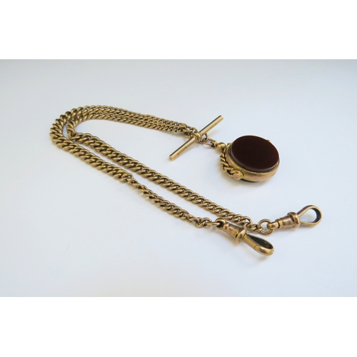 9075 - A 9ct gold watch chain with T-bar and hung with a bloodstone and cornelian swivel fob, 39cm long, 40... 