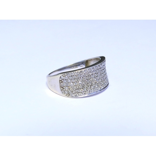 9190 - A 9ct white gold multi-stone diamond half hoop ring. Size Q/R, 3.4g