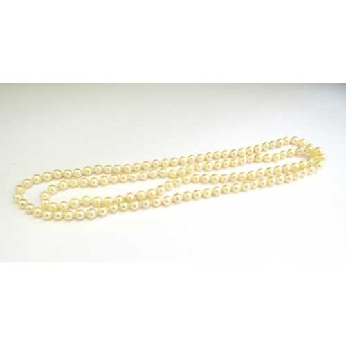 9244 - A single strand pearl necklace, 88cm long  (E)  £30-50