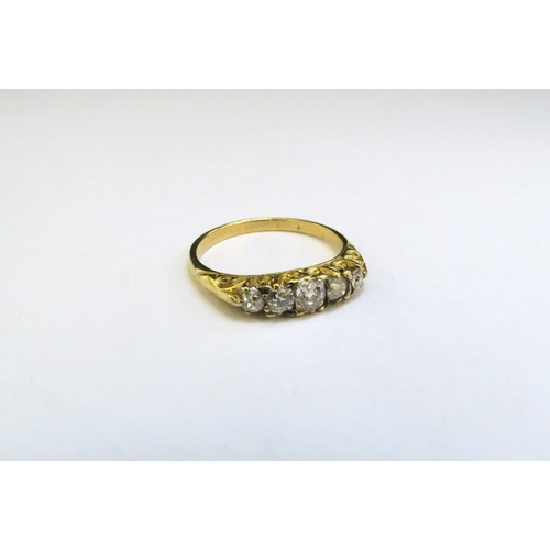 9255 - A gold five stone old cut diamond ring, unmarked. Size L, 2.5g