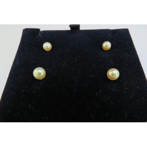 9375 - Two pairs of cultured pearl stud earrings