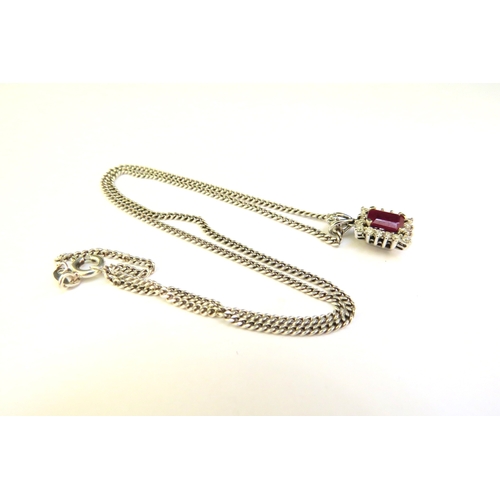 9037 - A white gold diamond and ruby pendant, unmarked, 2.1g hung on a 925 chain  (R)  £100