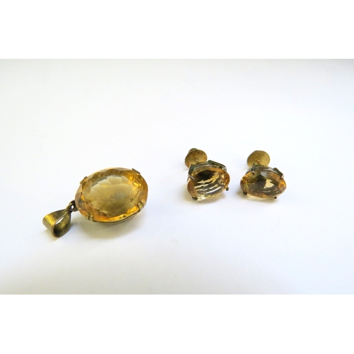 9305 - A citrine coloured pendant and similar earrings