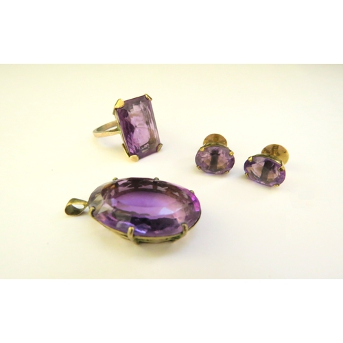 9371 - An amethyst ring, size O, earrings and pendant, all unmarked