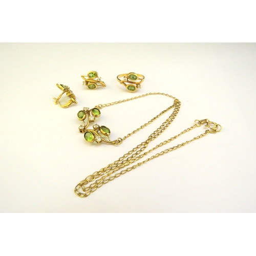 9181 - A suite of peridot jewellery consisting of earrings, ring, size Q and necklace, all stamped 750, 10.... 