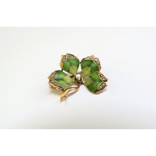 9147 - A gold enamel and pearl four leaf clover brooch by U.S jewellers Ostby and Barton, Ostby  perished i... 