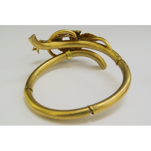 9198 - A Victorian yellow pinchbeck bracelet with naturalistic rosebud and leaf design