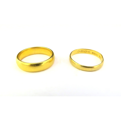 9351 - Two 22ct gold wedding bands. Size O, 6.7g and size P/Q, 2.3g