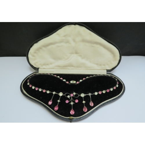 9001 - A paste set necklace with pink and clear stones in fitted case