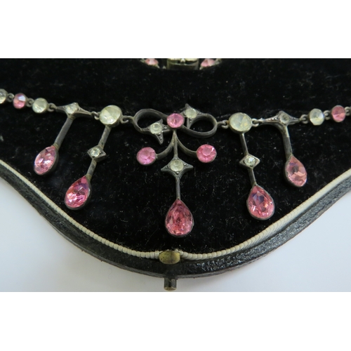 9001 - A paste set necklace with pink and clear stones in fitted case