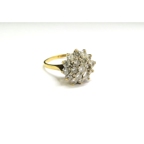 9062 - A gold diamond cluster ring, stamped 18ct. Size Q, 5.4g